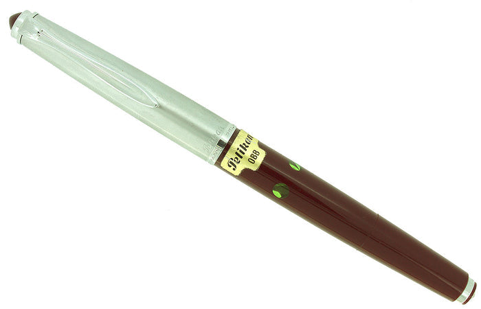 CIRCA 1958 PELIKAN P1 STAINLESS CAP BURGUNDY BARREL FOUNTAIN PEN NOS STICKERED OFFERED BY ANTIQUE DIGGER