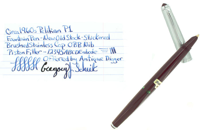 CIRCA 1958 PELIKAN P1 STAINLESS CAP BURGUNDY BARREL FOUNTAIN PEN NOS STICKERED OFFERED BY ANTIQUE DIGGER