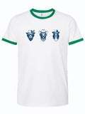 White t-shirt with green ringer sleeves featuring three dogs with cowboy hats on a white background
