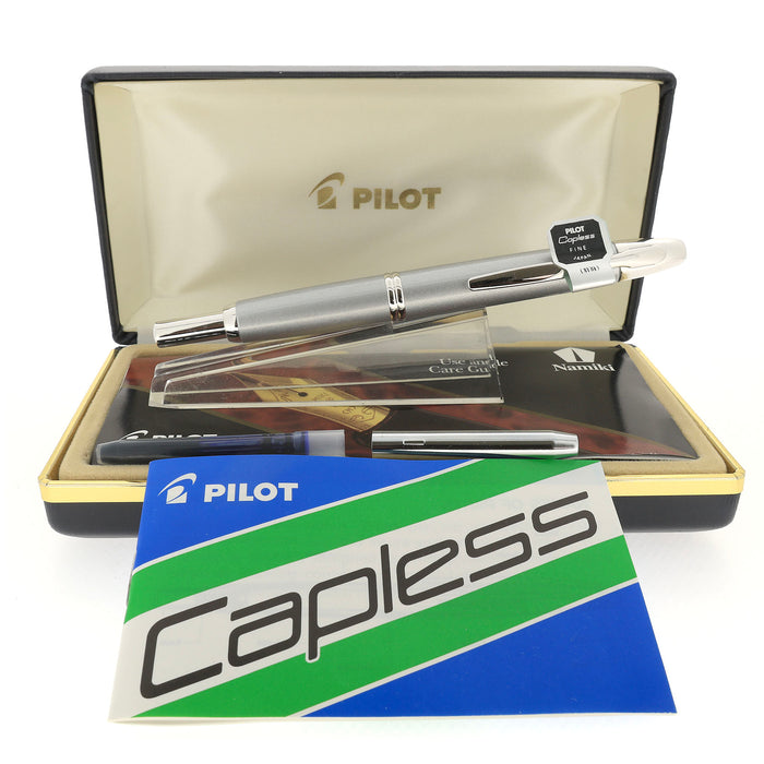 NEVER INKED 2004 PILOT CHROME VANISHING POINT 14K FINE NIB FOUNTAIN PEN NEW IN BOX OFFERED BY ANTIQUE DIGGER