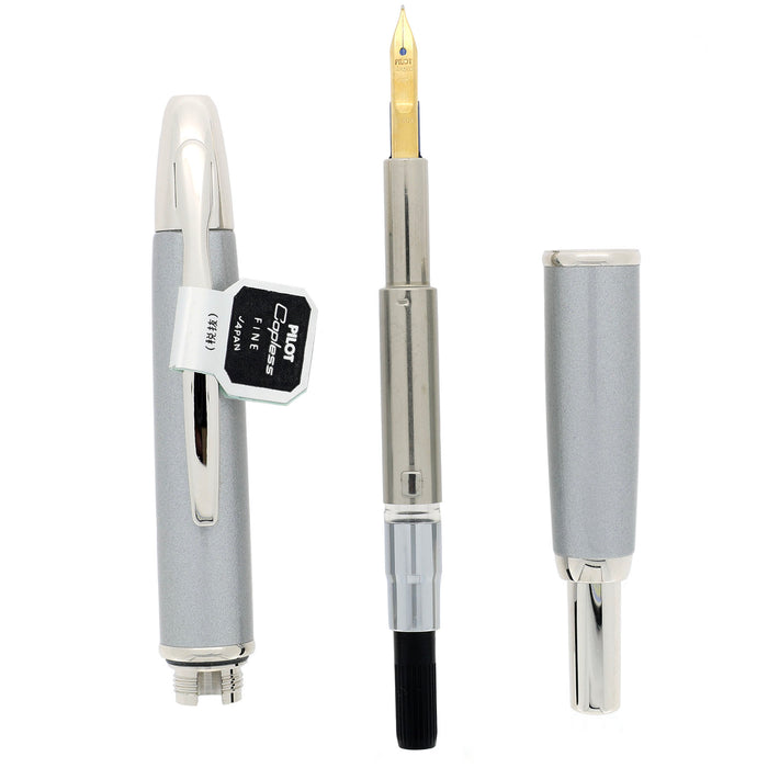 NEVER INKED 2004 PILOT CHROME VANISHING POINT 14K FINE NIB FOUNTAIN PEN NEW IN BOX OFFERED BY ANTIQUE DIGGER