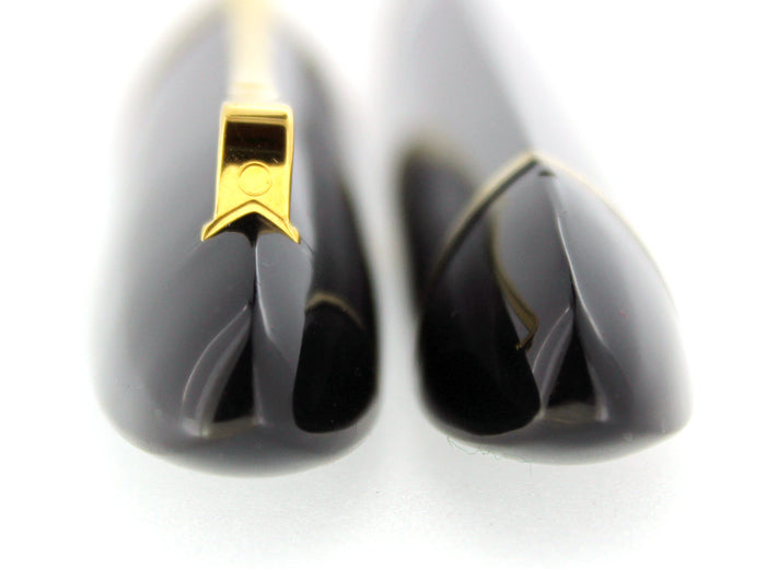 OMAS 360 JET BLACK ROLLERBALL PEN WITH GOLD TRIM NEW OLD STOCK WITH BOX AND PAPERWORK OFFERED BY ANTIQUE DIGGER