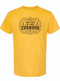 A yellow short-sleeve crewneck t-shirt with a black graphic print on the chest that reads 'THIS AIN'T MY FIRST CORNDOG' inside an ornate label design.